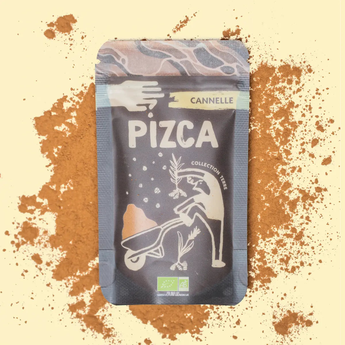 Sachet de 35g de cannelle moulue Bio Pizca sur fond de poudre de cannelle