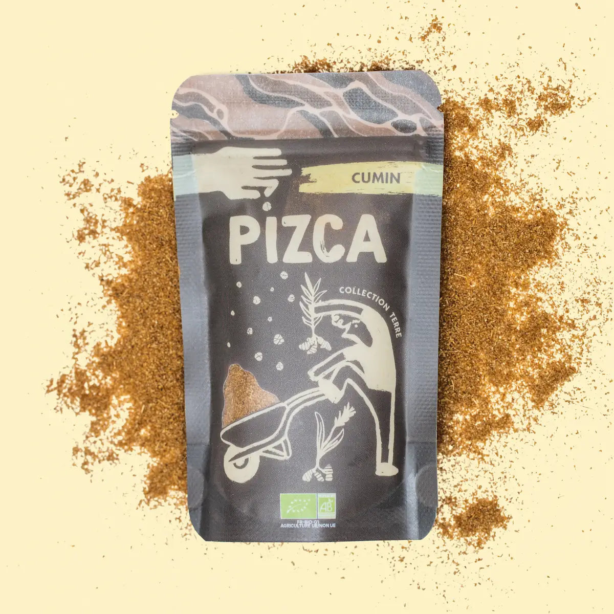 Sachet de 35g de cumin moulu Bio Pizca sur fond de poudre de cumin