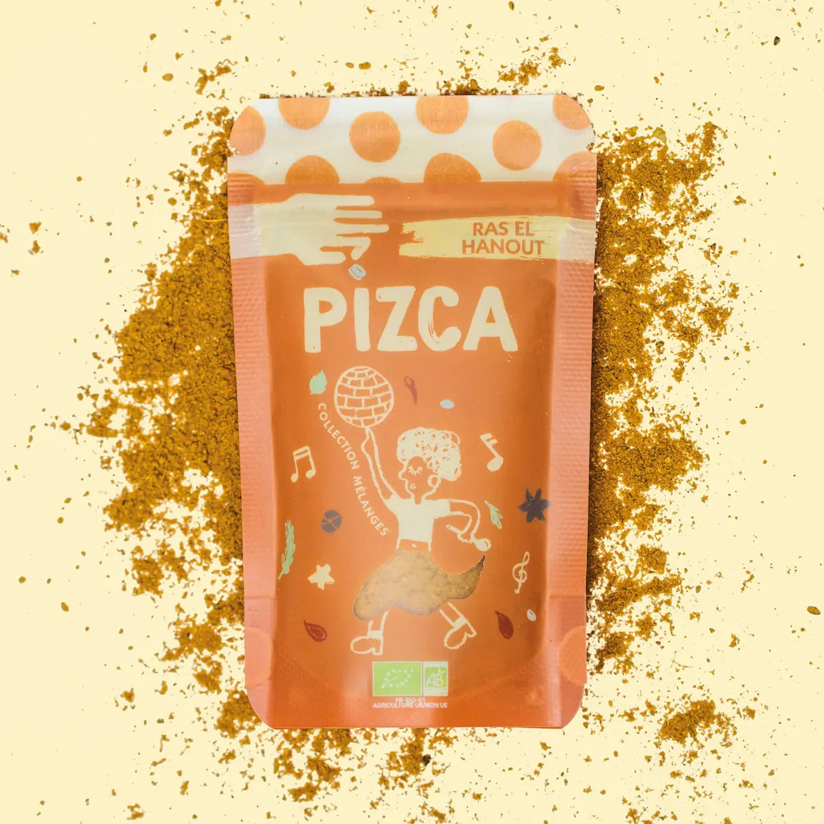 Sachet de 35g de Ras el Hanout moulu Bio Pizca sur fond de poudre de Ras el Hanout